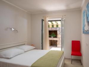 Ένα ή περισσότερα κρεβάτια σε δωμάτιο στο Apartment Pod Nespolom - One Bedroom Apartment with Terrace