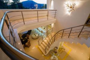 an overhead view of a spiral staircase in a house at SP Private Holidays in Anavissos +16 photos