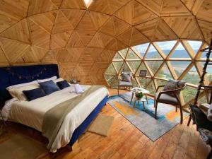 Postel nebo postele na pokoji v ubytování Laguna Glamping