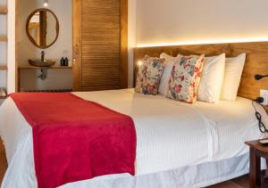 Hotel Hacienda Combia客房内的一张或多张床位