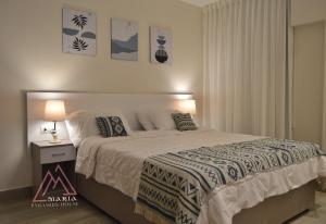 Letto o letti in una camera di Maria Pyramids House