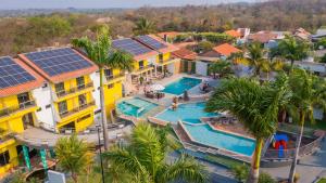 an aerial view of a resort with solar panels on its roofs at Marruá Hotel in Bonito