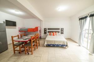 Postel nebo postele na pokoji v ubytování Palmeras Departamentos + 76 fotografií