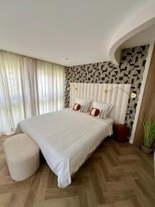 Postel nebo postele na pokoji v ubytování Spa et Sauna Luxueux Hyper centre + 21 fotografií