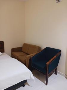 Voodi või voodid majutusasutuse Hotel Kavanass Inn toas