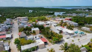an aerial view of a small town with houses at Casa Chukum en Rio Lagartos in Río Lagartos