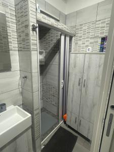 a bathroom with a shower and a sink at Room V 1944 in Lamezia Terme