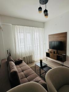TV a/nebo společenská místnost v ubytování Aqua apartman 45-2