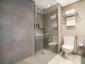 Um banheiro em Grand Mercure SP Itaim Bibi