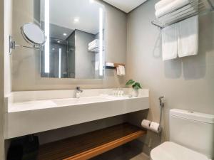 Um banheiro em Grand Mercure SP Itaim Bibi