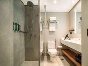 Um banheiro em Grand Mercure SP Itaim Bibi