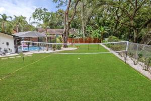 an image of a backyard with a soccer goal at Backyard Games, Fire Pit, Heated Pool, Near Beach in Ozona