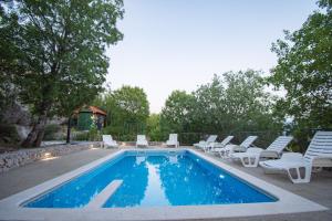 Bazén v ubytovaní Villa Madunic with private swimming pool alebo v jeho blízkosti