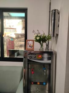 Nhà bếp/bếp nhỏ tại Zhuge Hospitality Homestay