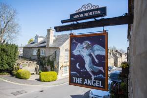 The logo or sign for the inn 