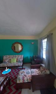 Llit o llits en una habitació de Marie's Beach House