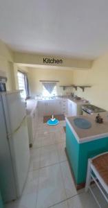 Cuina o zona de cuina de Marie's Beach House