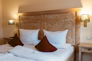 Postel nebo postele na pokoji v ubytování Hotel Kübler