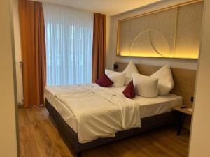Postel nebo postele na pokoji v ubytování Hotel Kübler