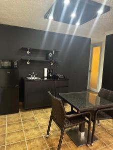 Kuchyň nebo kuchyňský kout v ubytování Apartamento en Fajardo