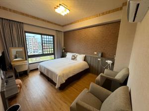 Postel nebo postele na pokoji v ubytování Otter Hotel + 7 fotografií