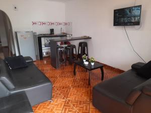 TV a/nebo společenská místnost v ubytování apartaestudios el jardin 2