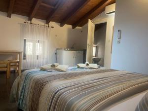 Postel nebo postele na pokoji v ubytování Boutique House Djak