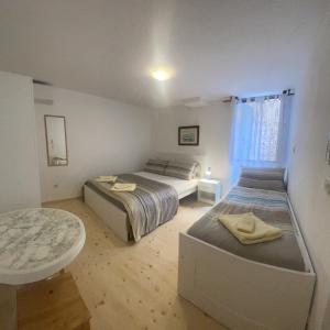 Postel nebo postele na pokoji v ubytování Boutique House Djak