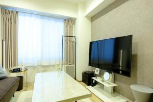 TV a/nebo společenská místnost v ubytování 東京新橋579 Shinbashi Residence
