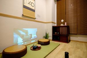 TV a/nebo společenská místnost v ubytování 東京新橋579 Shinbashi Residence