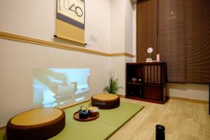 TV a/nebo společenská místnost v ubytování 東京新橋579 Shinbashi Residence