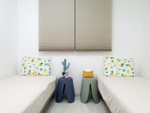Postel nebo postele na pokoji v ubytování Riahouse KINTEX 1min 2room