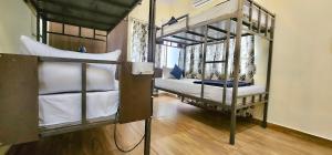 Voodi või voodid majutusasutuse Beedu - Backpackers Hostel toas