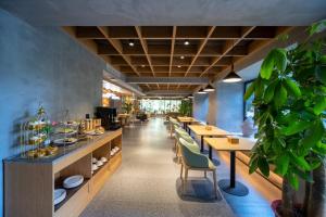 Restaurace v ubytování 秋果酒店长沙高铁南站雨花区政府地铁站店