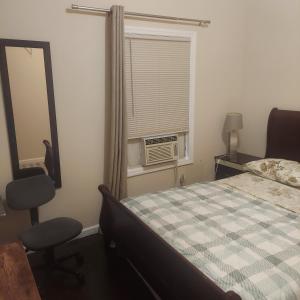Postel nebo postele na pokoji v ubytování Deluxe Room E