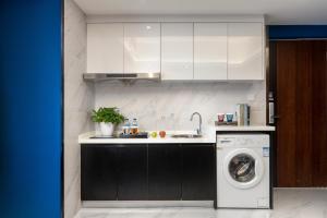 Nhà bếp/bếp nhỏ tại Chengdu Shuxi International Serviced Apartment