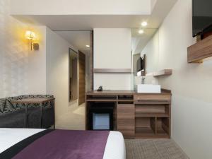 TV a/nebo společenská místnost v ubytování Hotel Vista Nagoya Nishiki