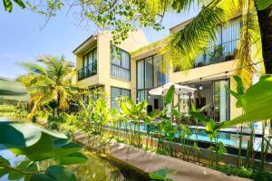 Κήπος έξω από το May Villa Hoi An-4Brs
