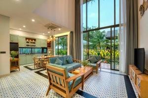 Μια τηλεόραση ή/και κέντρο ψυχαγωγίας στο May Villa Hoi An-4Brs