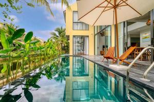 Πισίνα στο ή κοντά στο May Villa Hoi An-4Brs