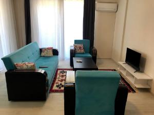TV a/nebo společenská místnost v ubytování Dalaman Pansiyon & Family rooms