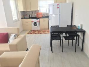 Kuchyň nebo kuchyňský kout v ubytování Dalaman Pansiyon & Family rooms