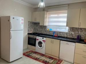 Kuchyň nebo kuchyňský kout v ubytování Dalaman Pansiyon & Family rooms