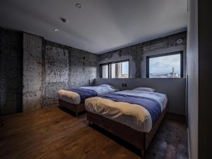 Arcade Hotel房間的床
