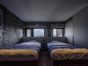 Arcade Hotel房間的床