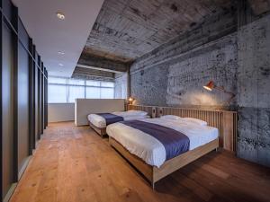 Arcade Hotel房間的床