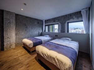 Arcade Hotel房間的床