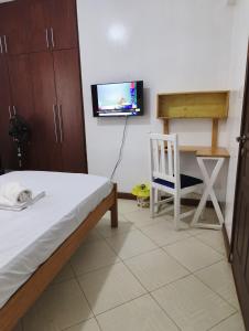 TV a/nebo společenská místnost v ubytování Barrizzi Studio Nyali Mombasa