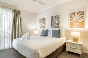 Ένα ή περισσότερα κρεβάτια σε δωμάτιο στο Byron Bay Beach Apartments +27 φωτογραφίες