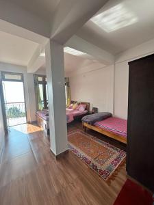 Postel nebo postele na pokoji v ubytování Kanchanjunga dealo homestay